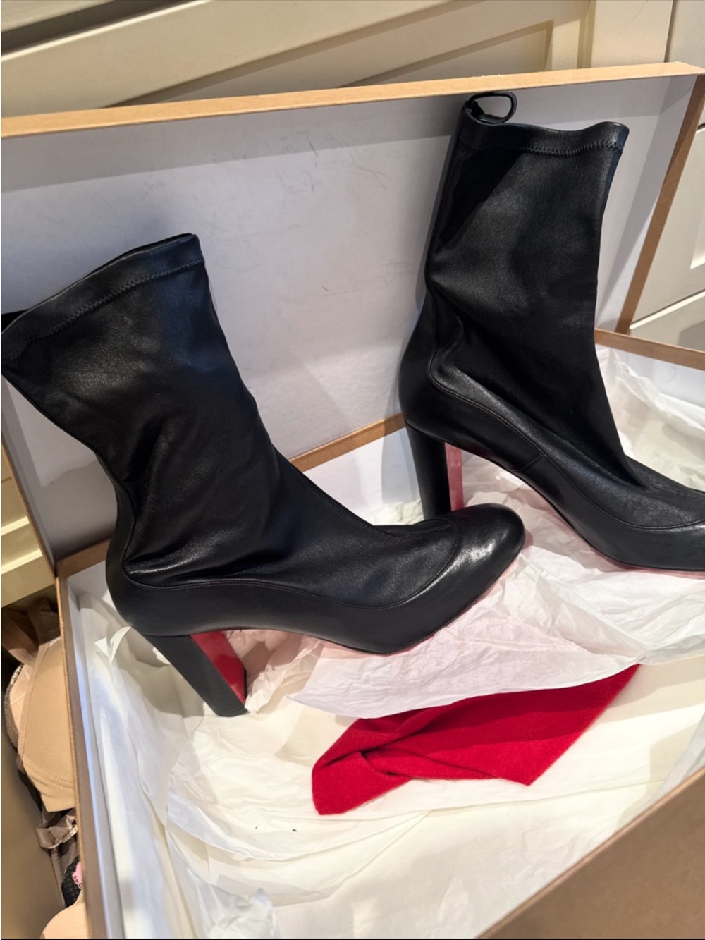 Christian Louboutin Black Leather Heeled boots with Red Dust Bag and box.